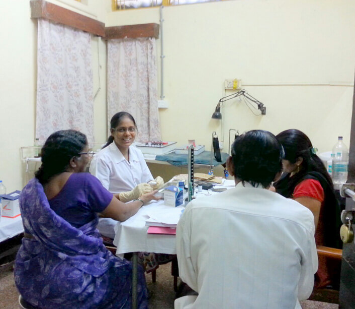Dr. Amole Ade  with patients